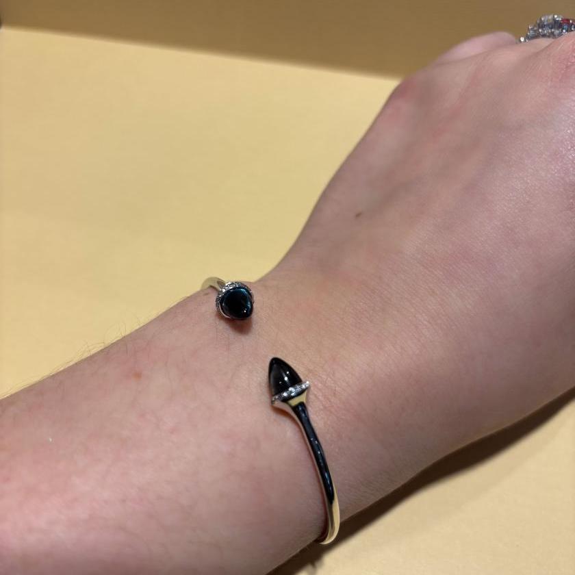 18CT WHITE GOLD & LONDON BLUE TOPAZ CUFF BANGLE