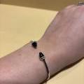 18CT WHITE GOLD & LONDON BLUE TOPAZ CUFF BANGLE