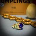 18CT YELLOW GOLD SUGARLOAF TANZANITE, EMERALD & DIAMOND RING