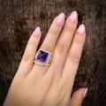 18CT YELLOW GOLD SUGARLOAF TANZANITE, EMERALD & DIAMOND RING